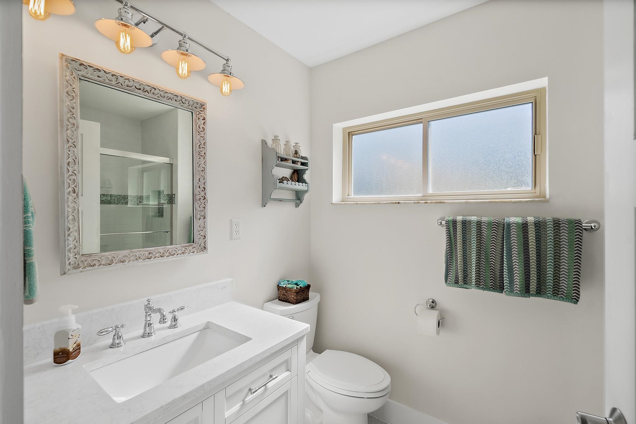 7 Sabor De Sal Road St. Augustine, FL 32080 - Photo 36 of 59 Full bath featuring a shower stall and vanity