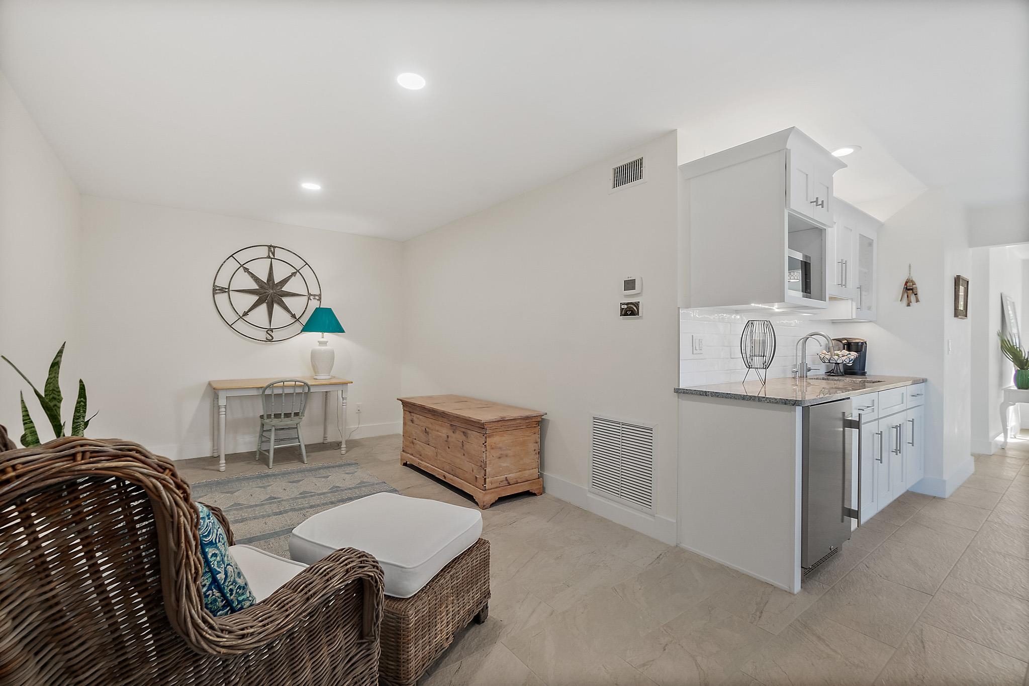 7 Sabor De Sal Road St. Augustine, FL 32080 - Photo 41 of 59 Living area with access to backyard and kitchenette