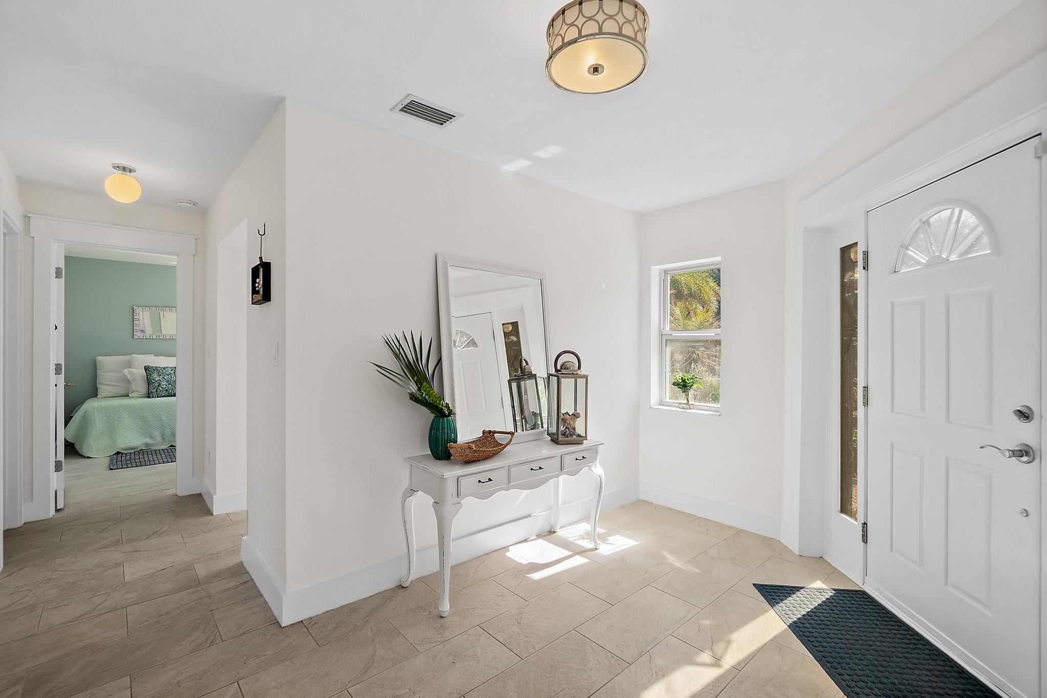 7 Sabor De Sal Road St. Augustine, FL 32080 - Photo 43 of 59 Entryway featuring baseboards and light tile patterned floors