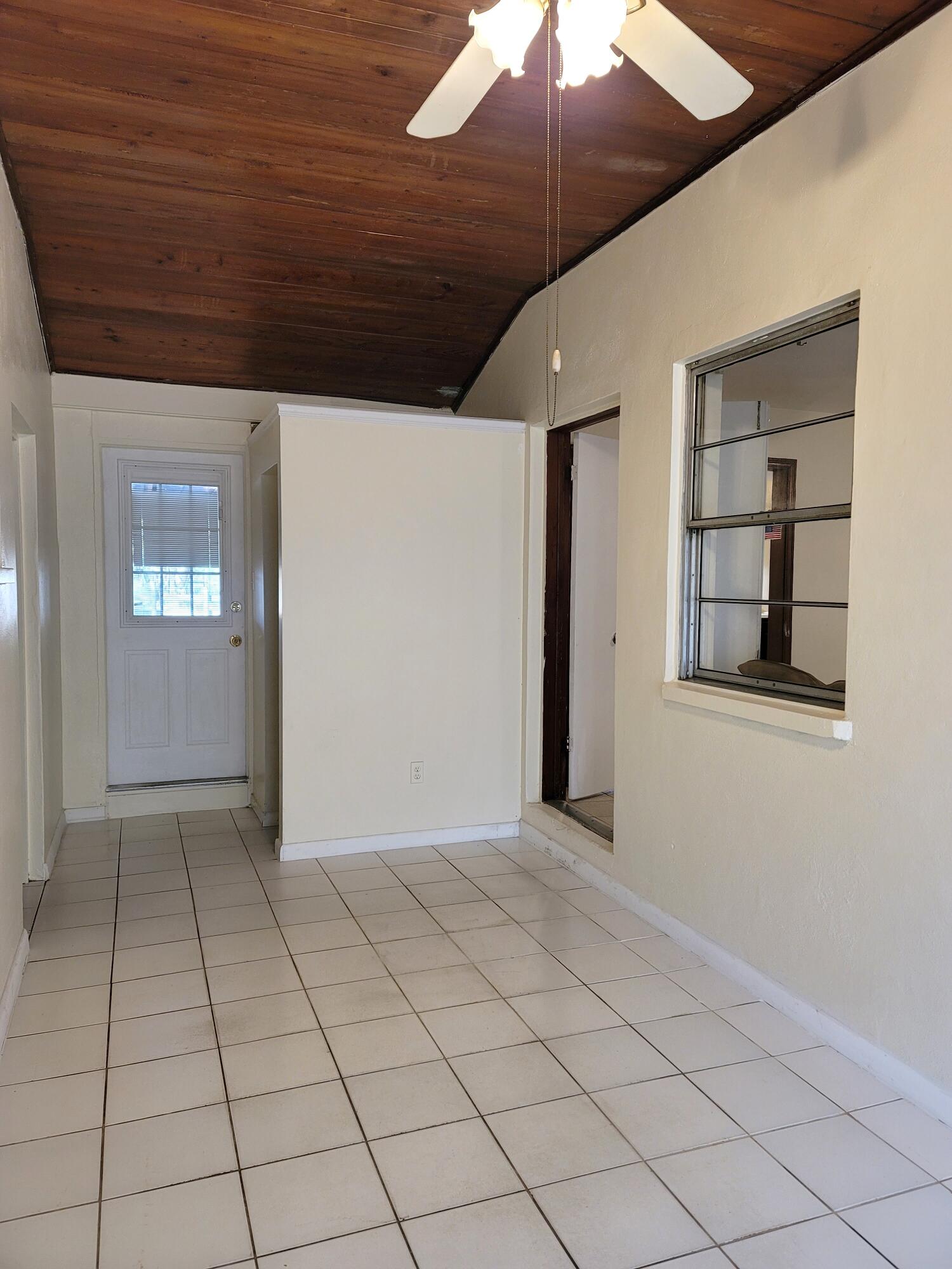 4362 West Midway Road Fort Pierce, FL 34981 - Photo 15 of 29 SECOND ENTRANCE FROM REAR PORCH