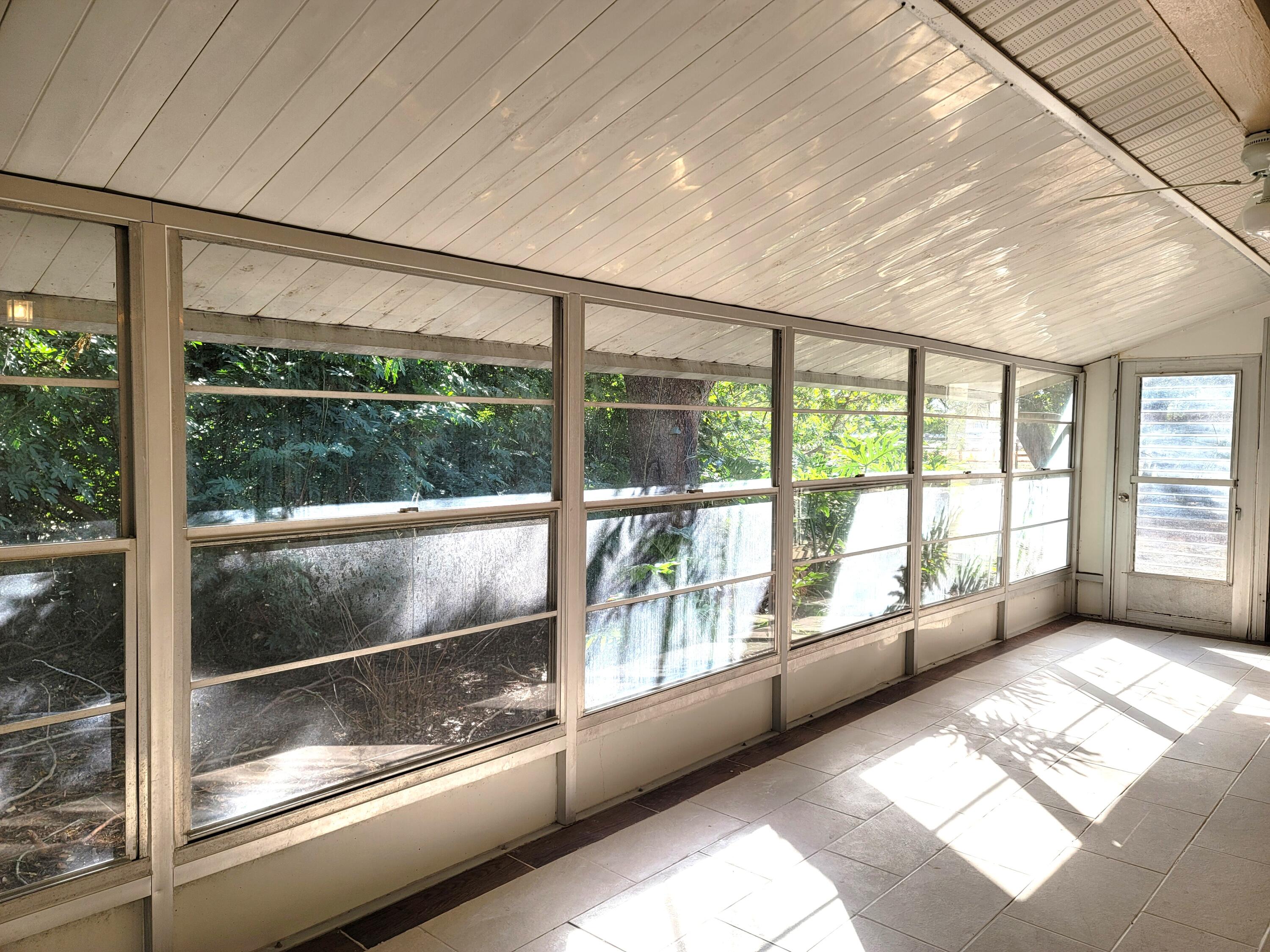 4362 West Midway Road Fort Pierce, FL 34981 - Photo 21 of 29 PRIVATE, ENCLOSED PORCH - FRONT OF HOME