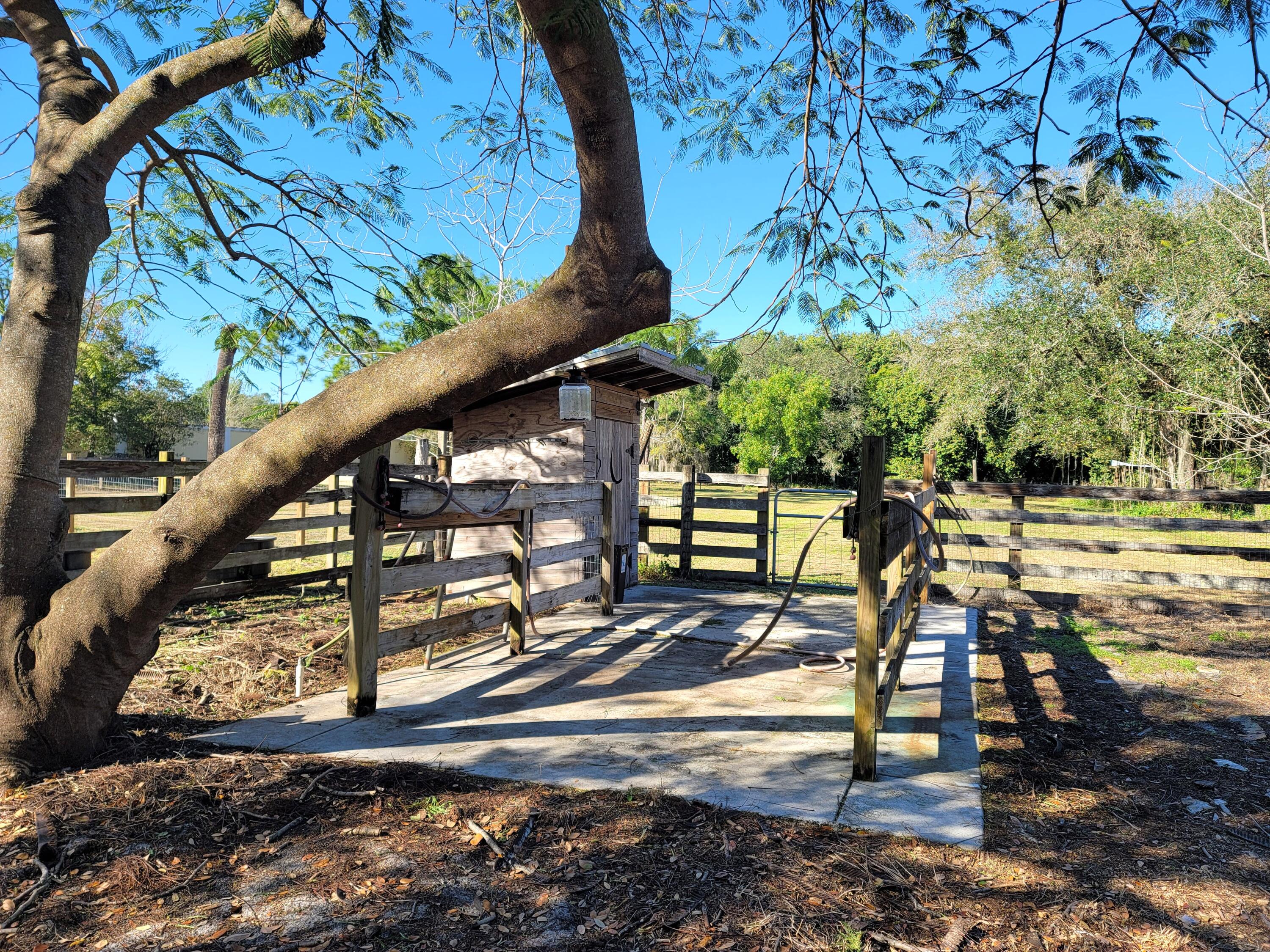 4362 West Midway Road Fort Pierce, FL 34981 - Photo 26 of 29 BATHING BAY WITH GATE TO PASTURE