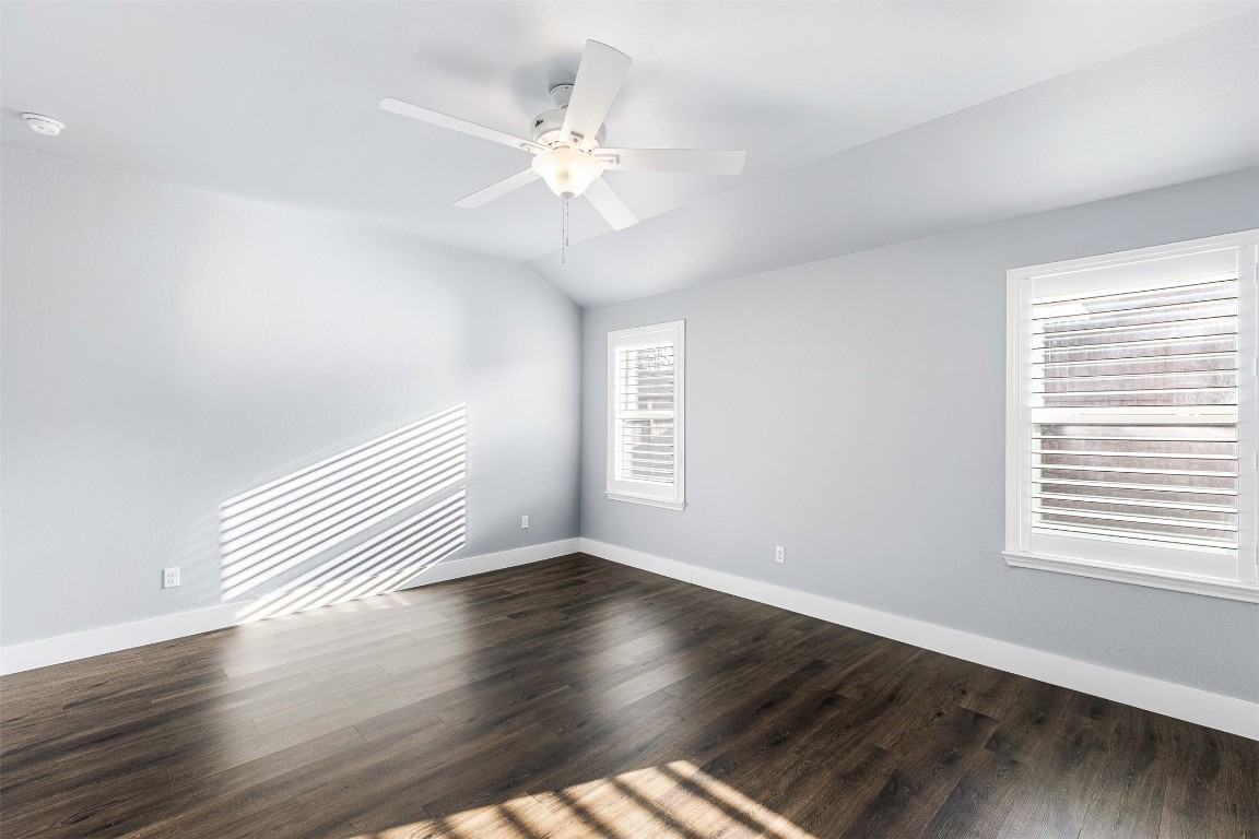 16016 Birch Bay Lane Conroe, TX 77384 - Photo 10 of 37 a view of an empty room with wooden floor and a window