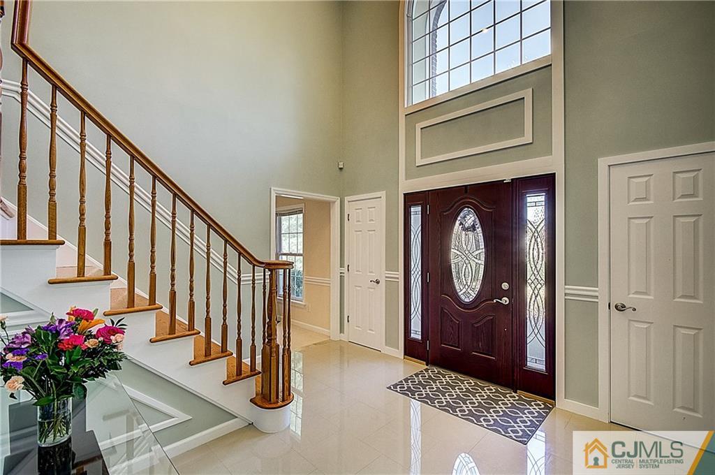 35 Williams Road Edison, NJ 08820 - Photo 3 of 47 a front view of a house with entryway wooden floor and front door