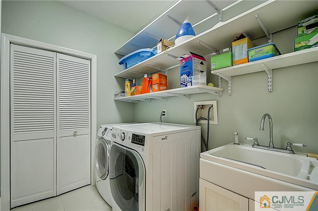 35 Williams Road Edison, NJ 08820 - Photo 23 of 47 a utility room with dryer and washer