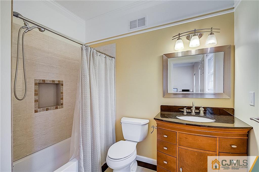 35 Williams Road Edison, NJ 08820 - Photo 27 of 47 a bathroom with a granite countertop sink toilet and shower