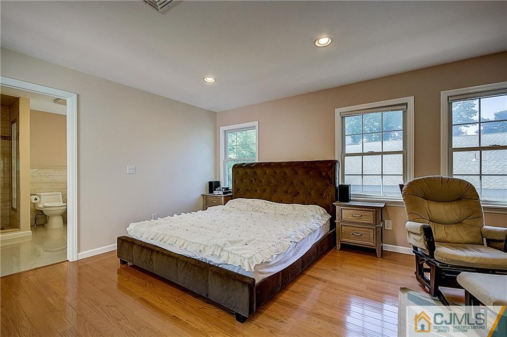 35 Williams Road Edison, NJ 08820 - Photo 30 of 47 a bedroom with a bed and window