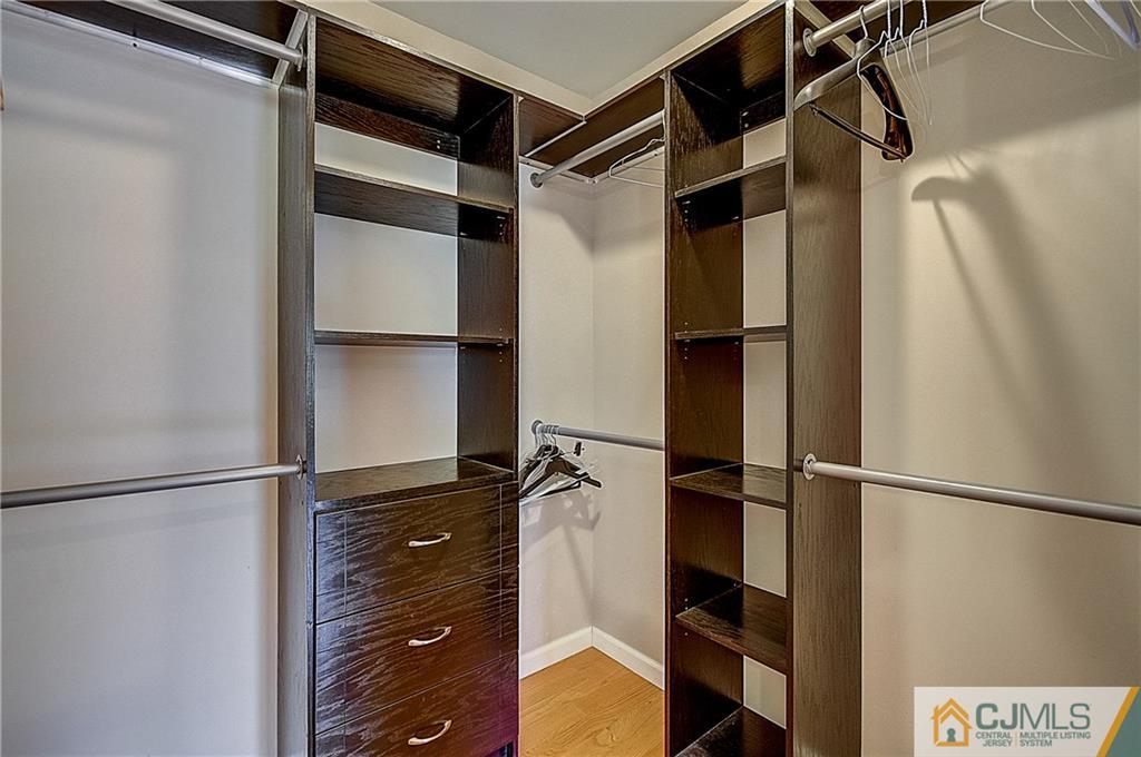 35 Williams Road Edison, NJ 08820 - Photo 37 of 47 a view of walk in closet with clothes and shoes