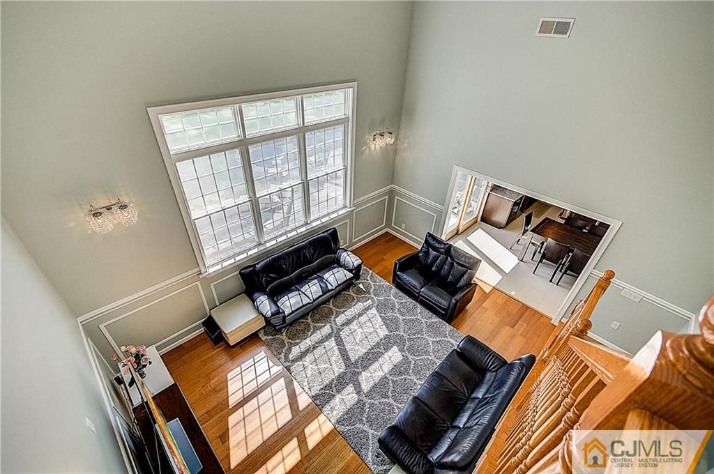 35 Williams Road Edison, NJ 08820 - Photo 5 of 47 a living room with a bed and a window