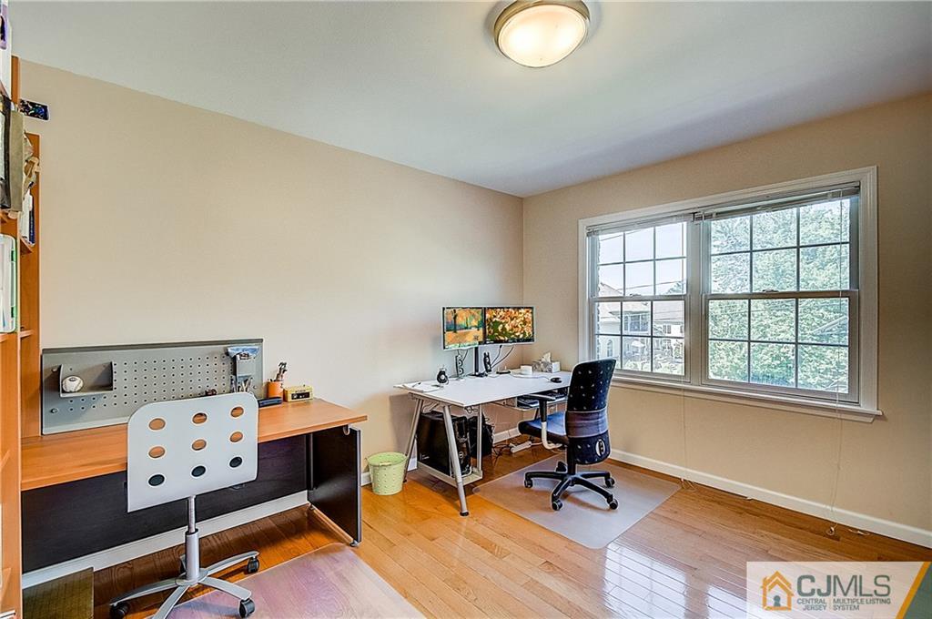 35 Williams Road Edison, NJ 08820 - Photo 42 of 47 a view of a workspace with furniture and a window