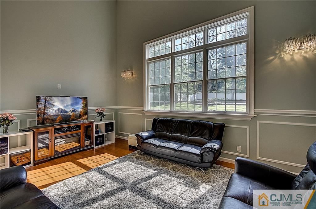 35 Williams Road Edison, NJ 08820 - Photo 7 of 47 a living room with furniture and a flat screen tv
