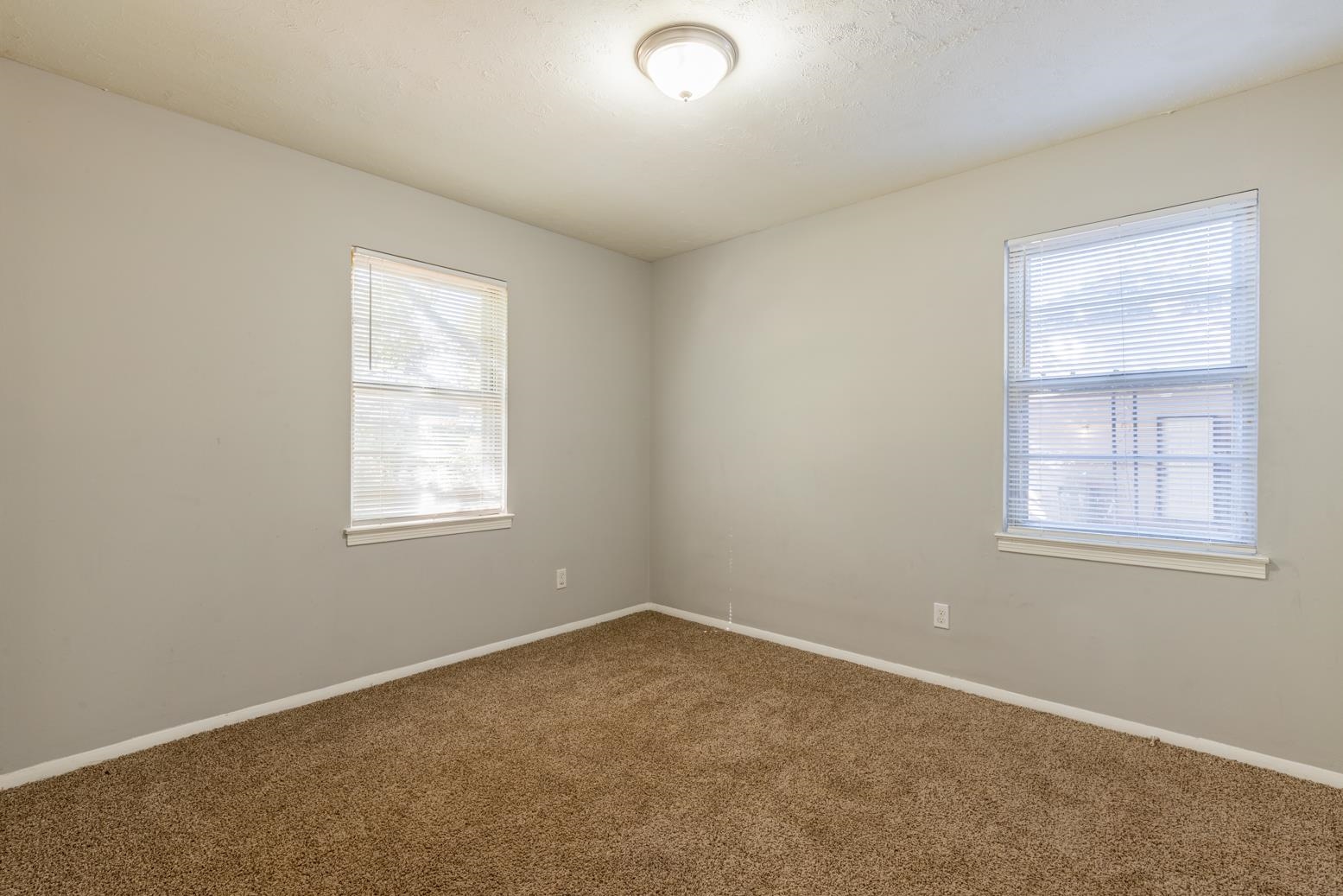 5581 Lochinvar Road Memphis, TN 38116 - Photo 14 of 19 an empty room with a window
