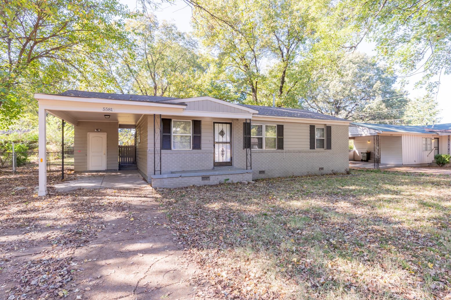 5581 Lochinvar Road Memphis, TN 38116 - Photo 2 of 19 a view of a house with a yard