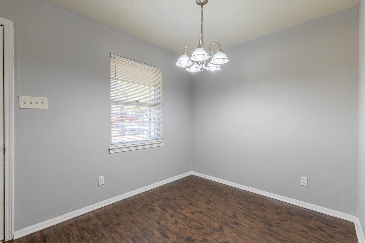 5581 Lochinvar Road Memphis, TN 38116 - Photo 7 of 19 a view of a windows and chandelier in a room