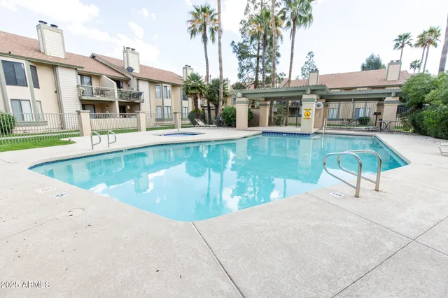 a view of a house with a swimming pool