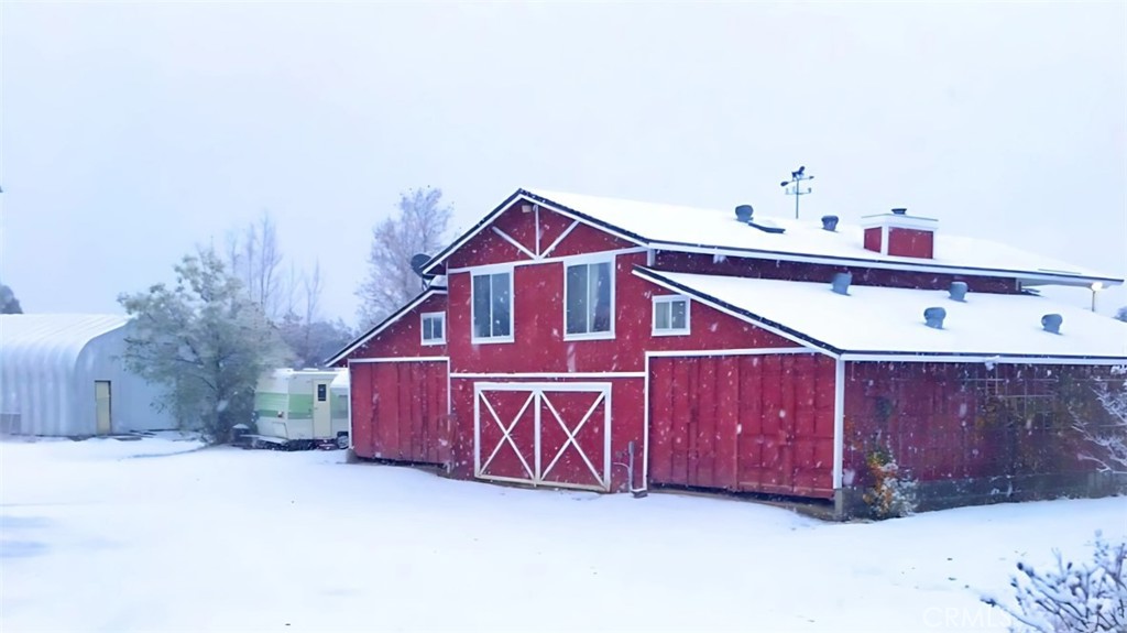 a front view of a house with garage