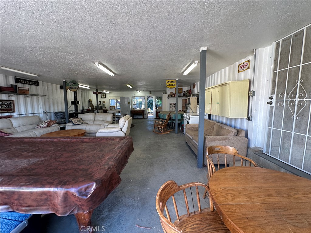 29820 Chihuahua Valley Road Warner Springs, CA 92086 - Photo 35 of 75 a living room with furniture and a flat screen tv