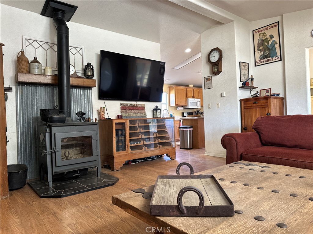 29820 Chihuahua Valley Road Warner Springs, CA 92086 - Photo 54 of 75 a living room with furniture and a flat screen tv