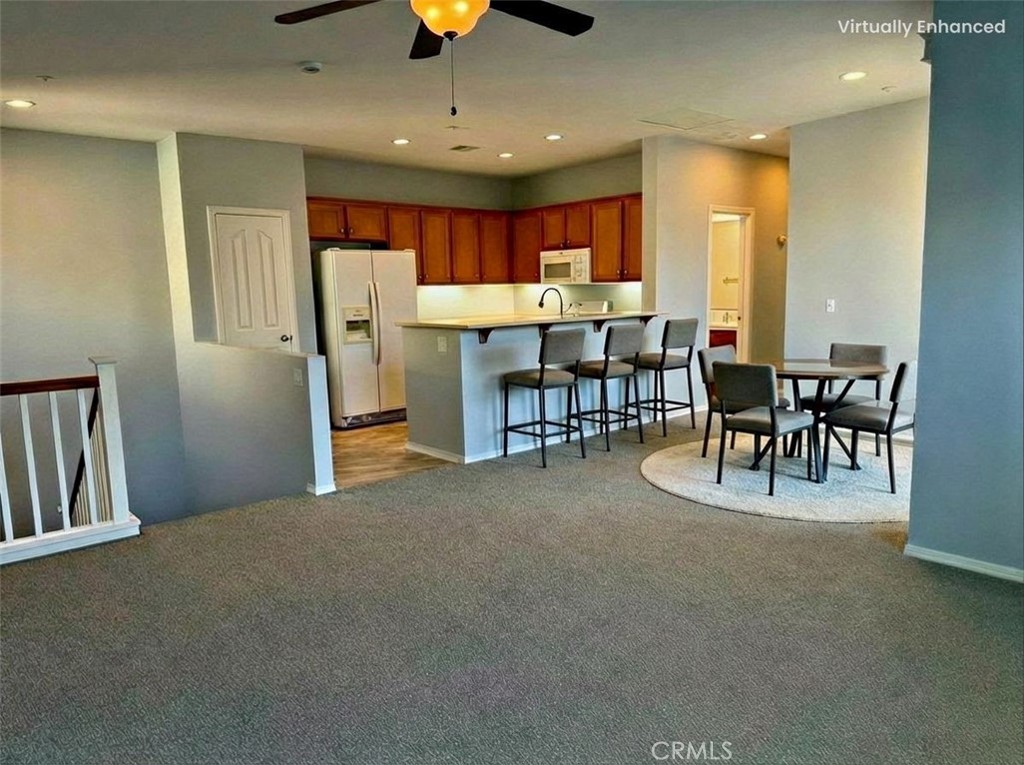 36368 Grazia Way Winchester, CA 92596 - Photo 11 of 27 a view of kitchen and dining room
