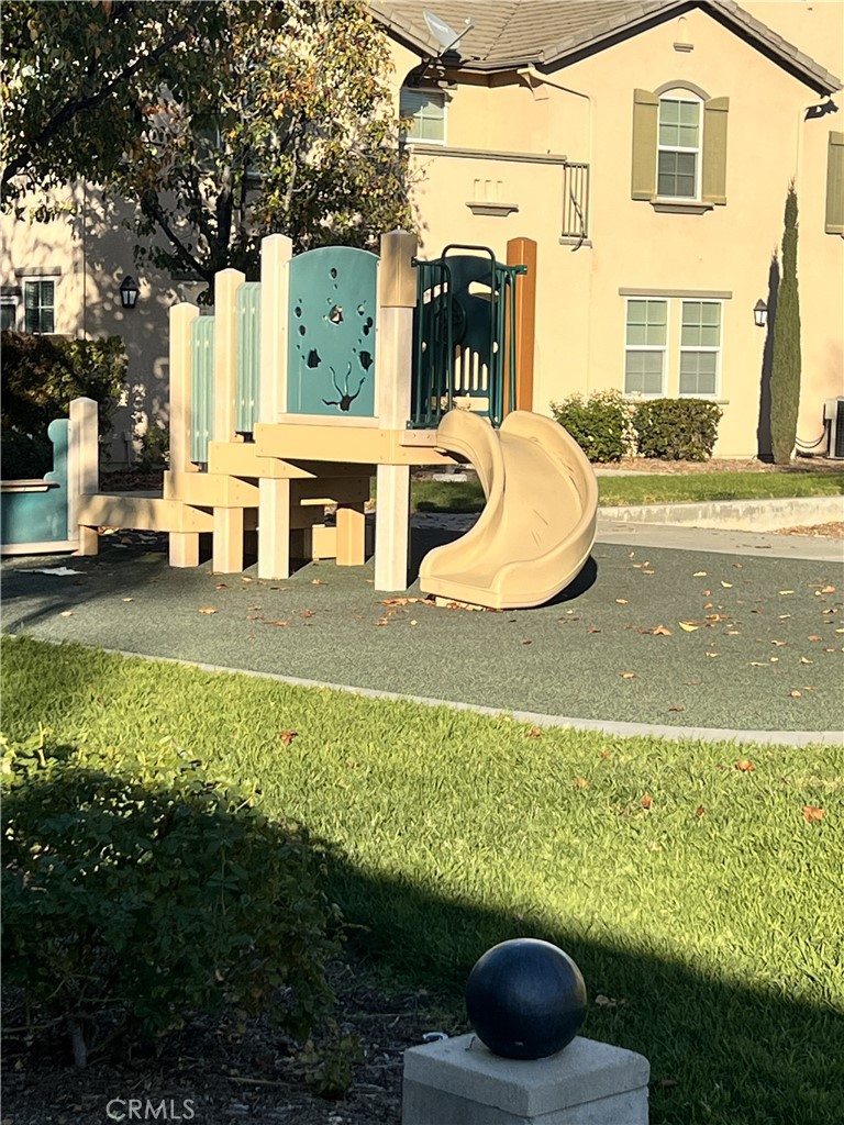 36368 Grazia Way Winchester, CA 92596 - Photo 4 of 27 a view of a house with a yard