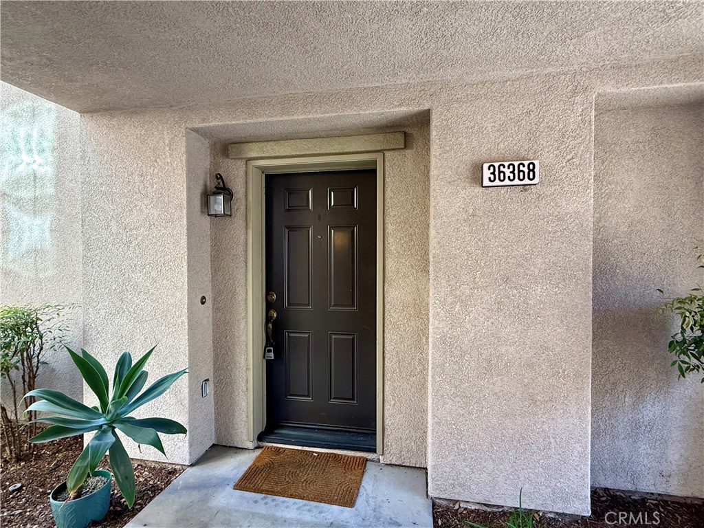 36368 Grazia Way Winchester, CA 92596 - Photo 5 of 27 a view of entryway with wooden floor