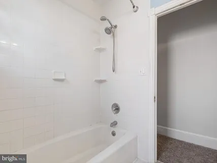 a bathroom with a bathtub