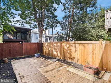 a view of a backyard of the house