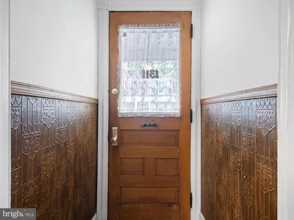 a bathroom with a shower and a sink
