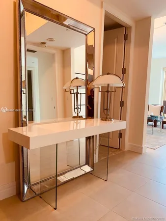 a close view of sink and cabinets