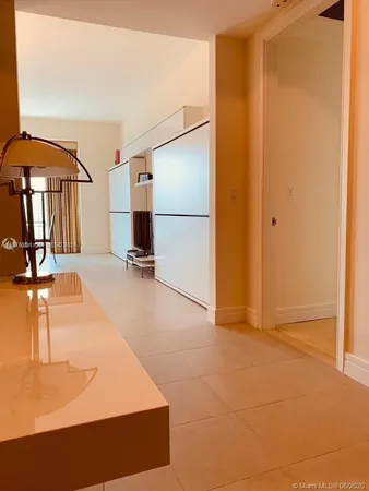 a kitchen with granite countertop stainless steel appliances and cabinets
