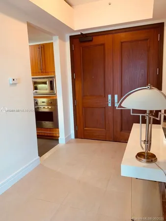a view of swimming pool with a table and chairs