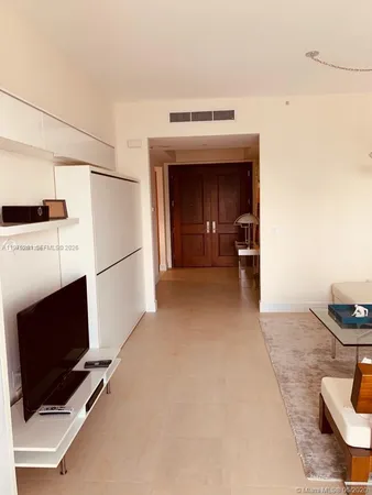 a view of a livingroom with furniture