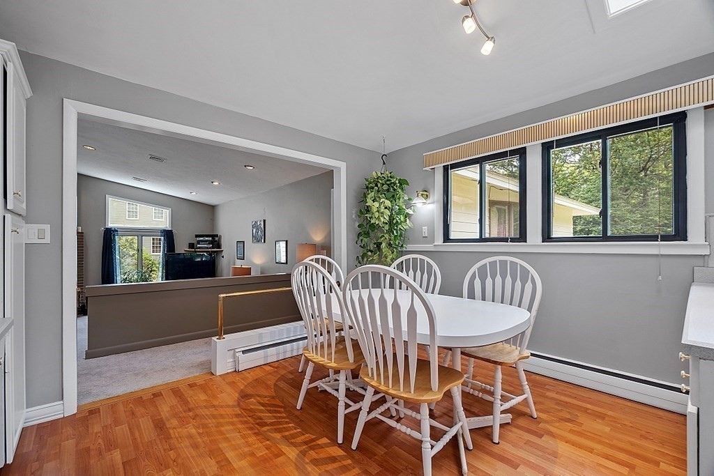 12 Sheridan Road Andover, MA 01810 - Photo 24 of 40 a view of a dining room with furniture window and wooden floor