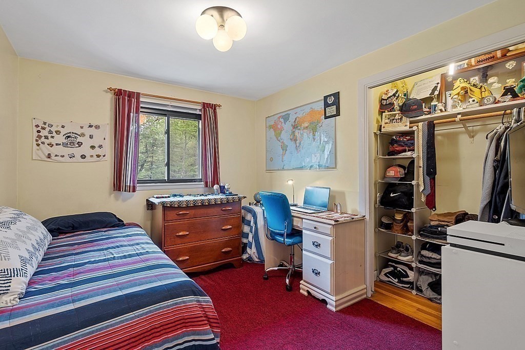 12 Sheridan Road Andover, MA 01810 - Photo 29 of 40 a bedroom with furniture and a window