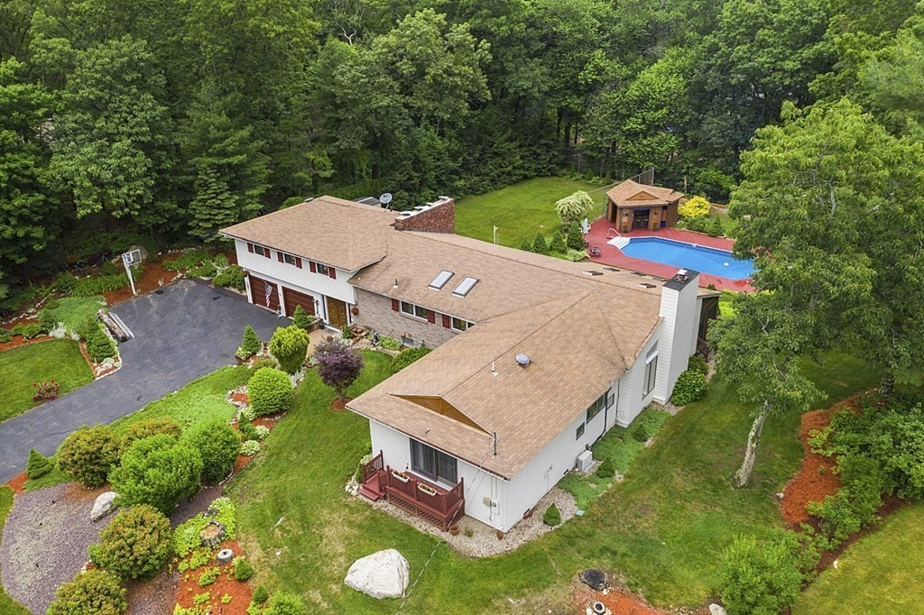 12 Sheridan Road Andover, MA 01810 - Photo 3 of 40 an aerial view of a house with a garden