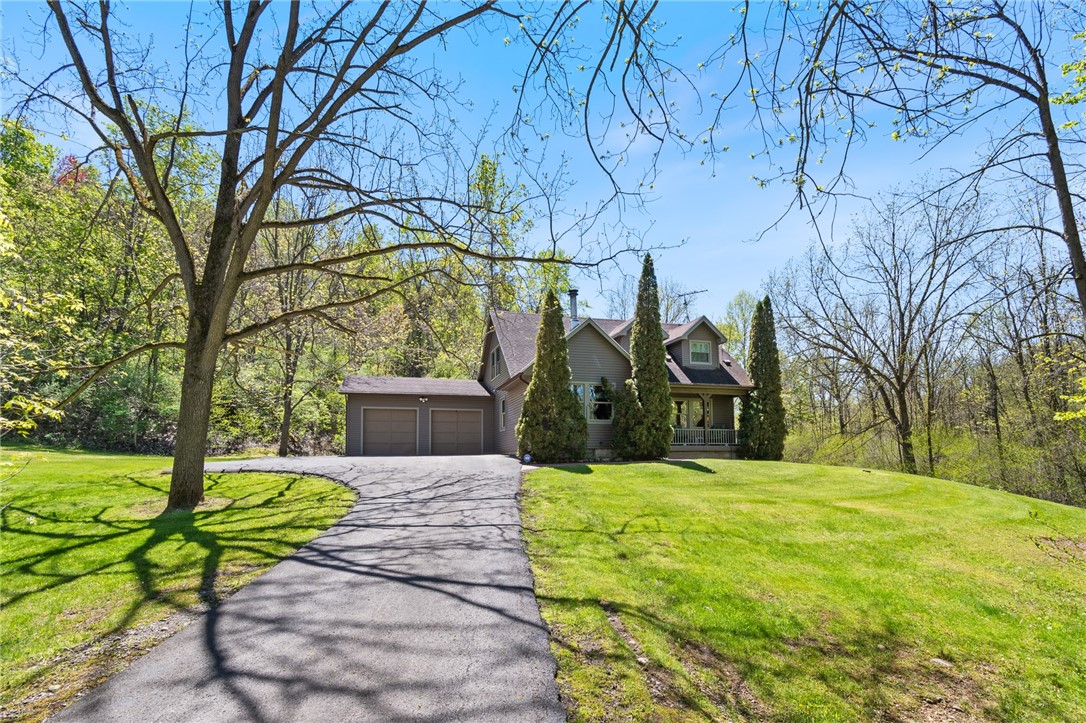 4397 Sebring Road Sodus, NY 14551 - Photo 10 of 43 The driveway back - a gentle slope!