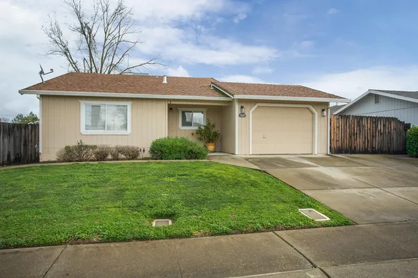 front view of a house and a yard