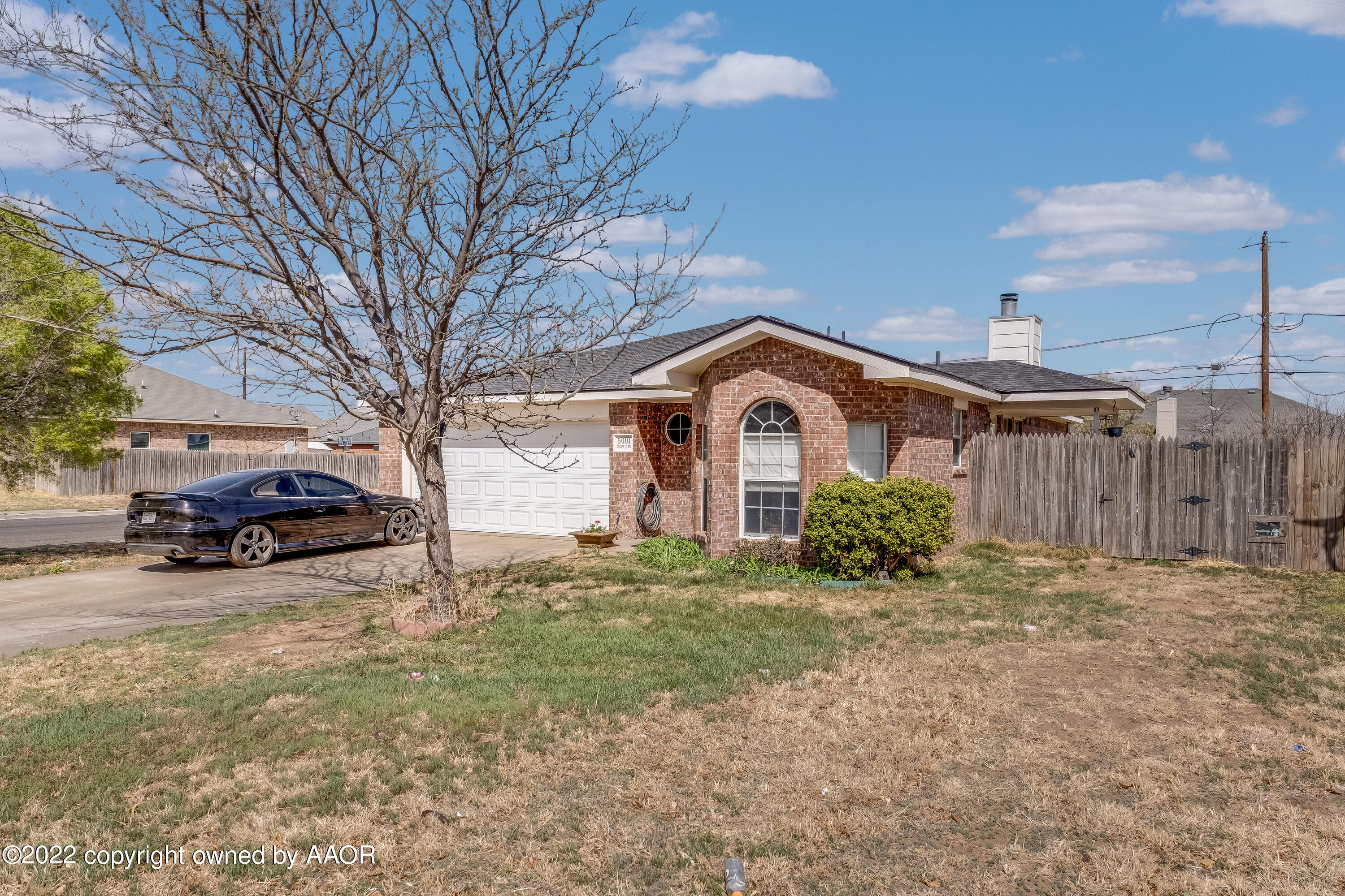 5001 Capulin Lane Amarillo, TX 79110 - Photo 21 of 22 a view of a house with a yard