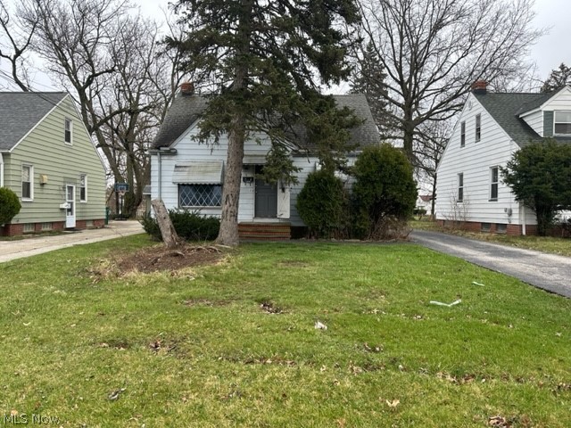 5615 Dunham Road Maple Heights, OH 44137 - Photo 29 of 29 View of front facade with a front lawn
