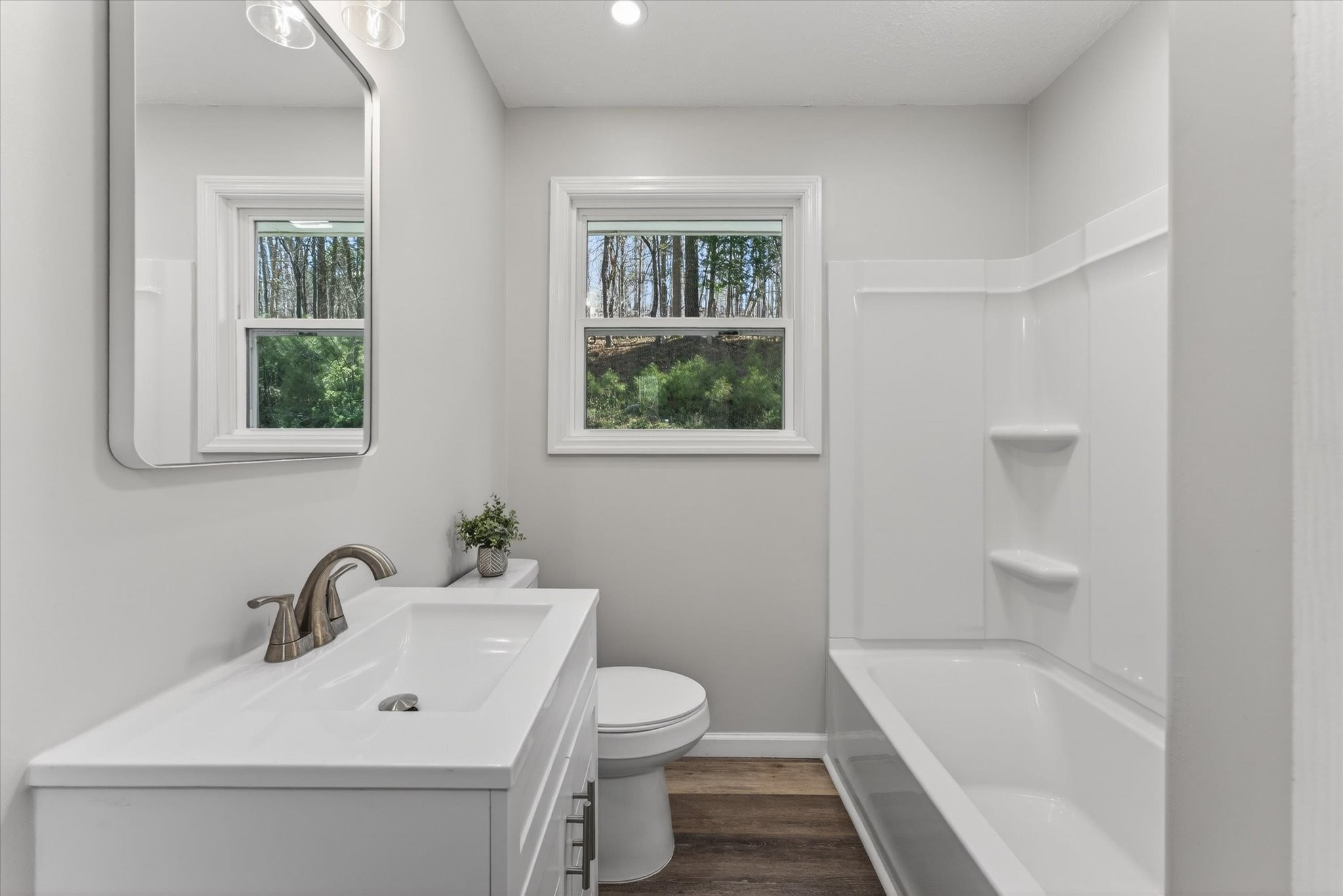 5075 Logan Road Cunningham, TN 37052 - Photo 15 of 22 a bathroom with a sink toilet and shower