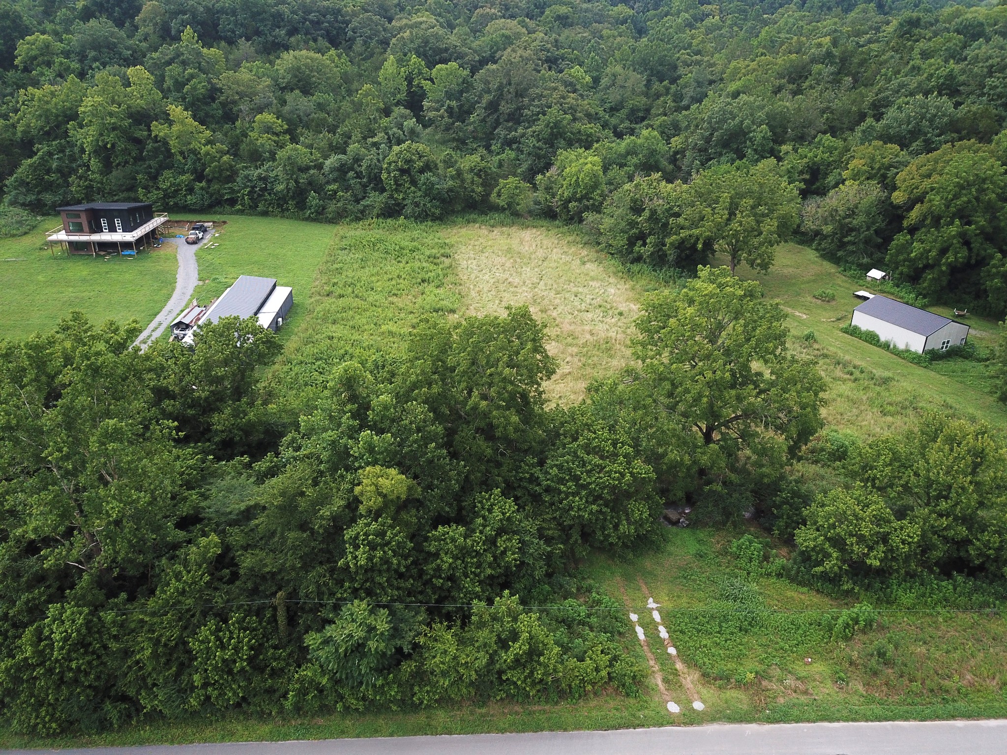 0 Norton Branch Road Beechgrove, TN 37018 - Photo 4 of 5 an aerial view of a house with a yard