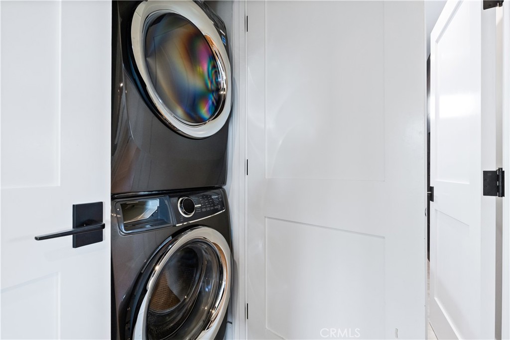 8214 Bass Point Road Bradley, CA 93426 - Photo 41 of 68 laundry in closet downstairs by bedrooms