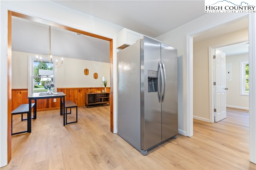 90 Camp Branch Road Waynesville, NC 28786 - Photo 12 of 34 a view of kitchen with furniture and wooden floor