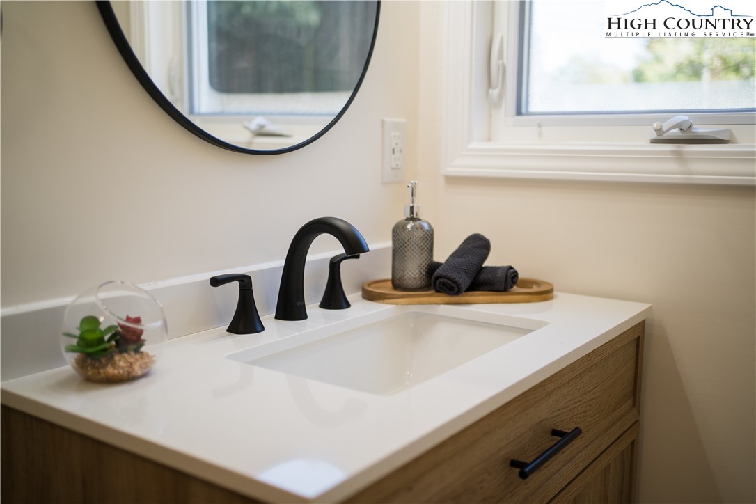 90 Camp Branch Road Waynesville, NC 28786 - Photo 17 of 34 a close view of sink and tap
