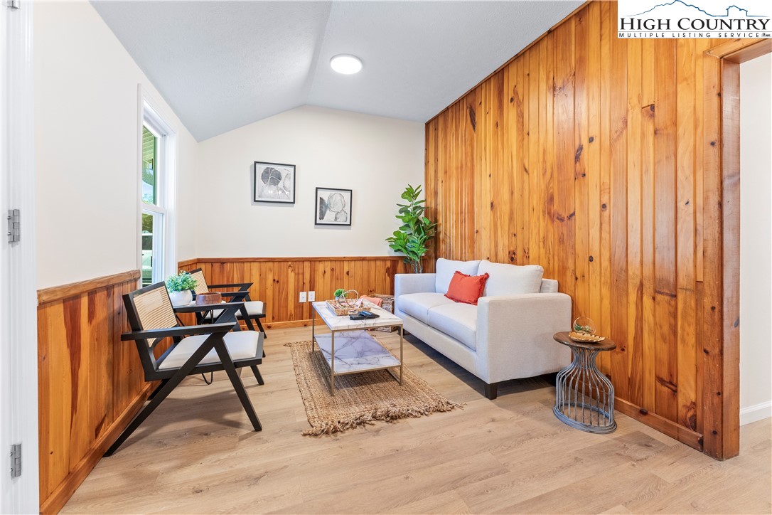 90 Camp Branch Road Waynesville, NC 28786 - Photo 5 of 34 a living room with furniture and a window