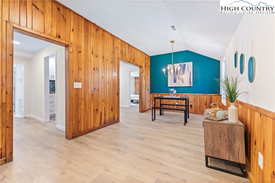 90 Camp Branch Road Waynesville, NC 28786 - Photo 10 of 34 a living room with furniture and a painting on the wall