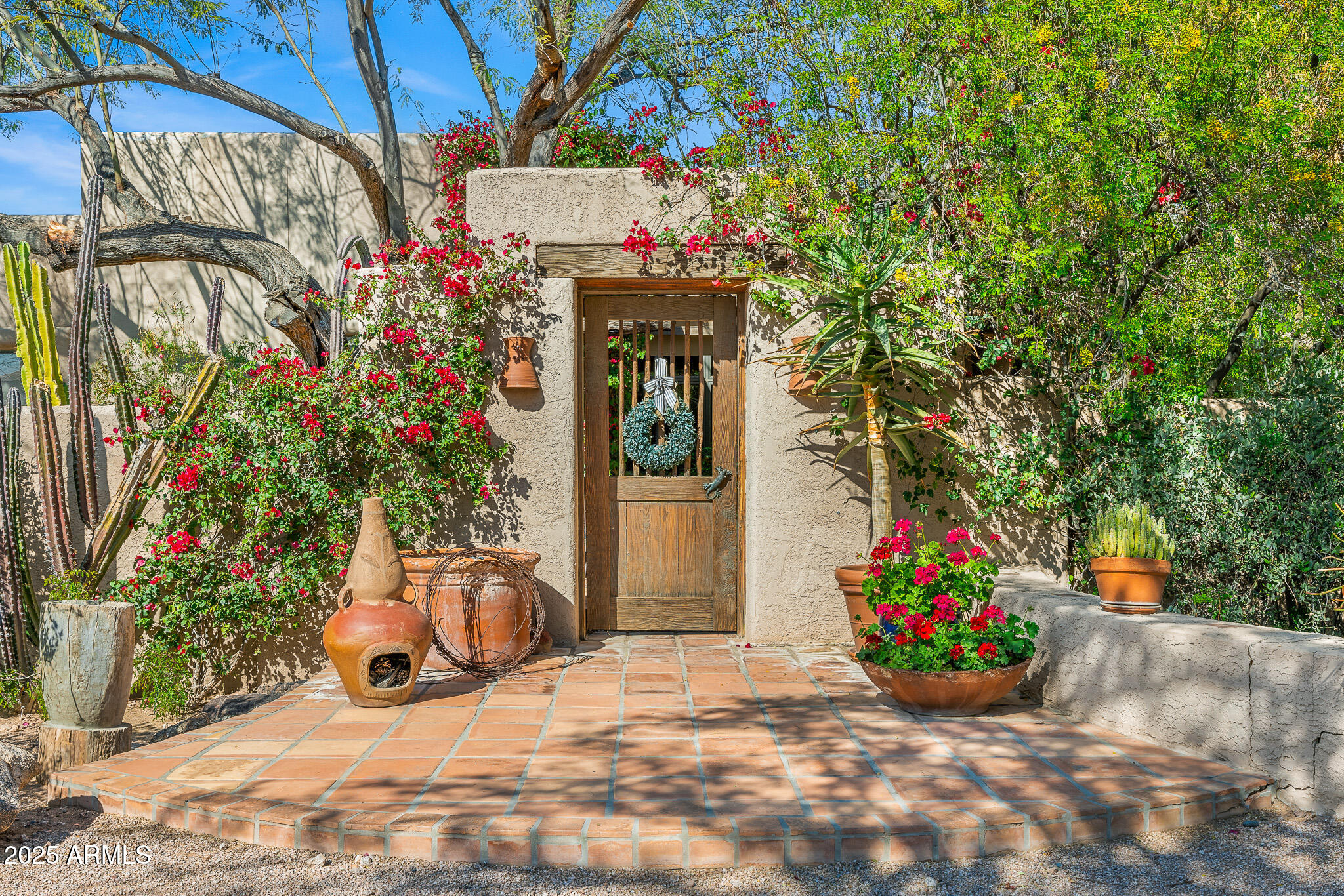 6301 North Camelback Manor Drive, Unit 5 Paradise Valley, AZ 85253 - Photo 7 of 17 front entrance to courtyard