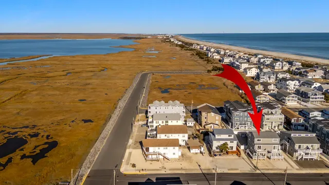a front view of a house with a deck