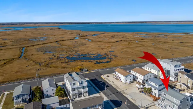 a front view of residential houses with street