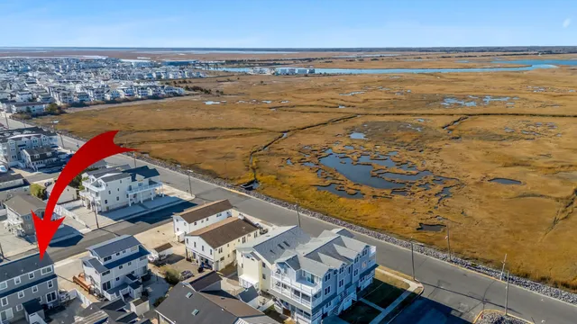 a large building with a window and balcony